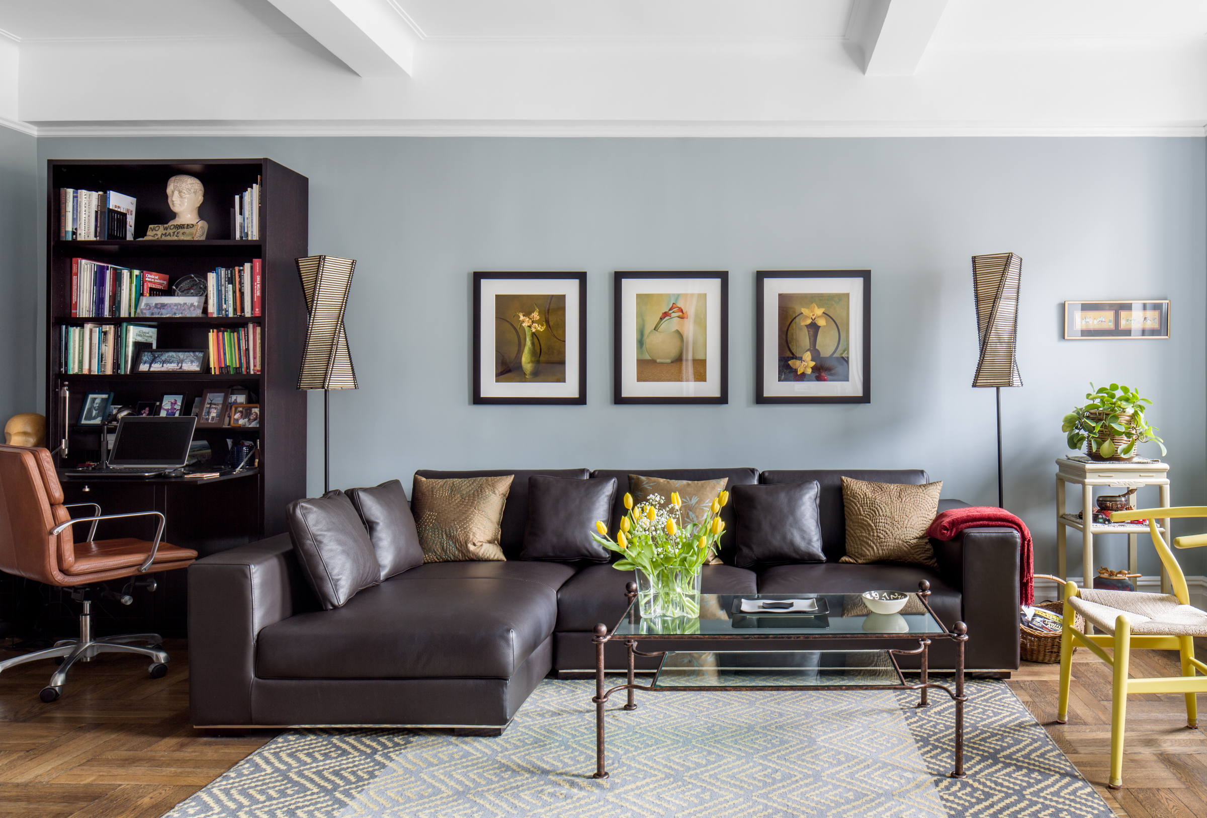 eclectic New York City apartment with leather sofa