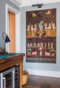 tapestry hanging on the wall of an apartment