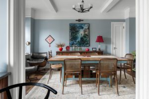 dining room with large table and leather chairs