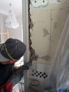 demolishing a kitchen wall