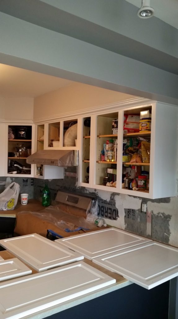 Kitchen cabinets with their doors removed