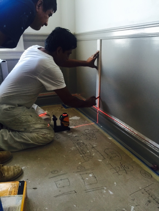 Laying out wainscoting with a laser level