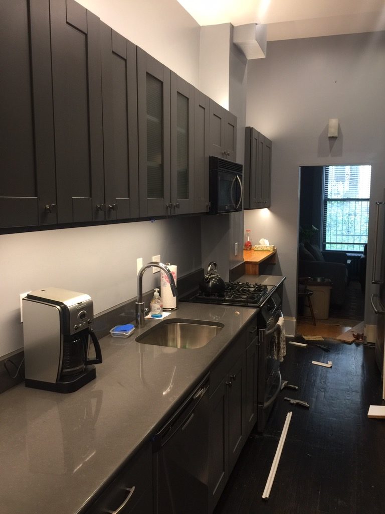 A completed Manhattan Townhouse Kitchen makeover with painted kitchen cabinets