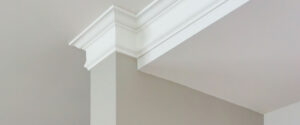 Crown molding in the ceiling corner of a room carpentry painting