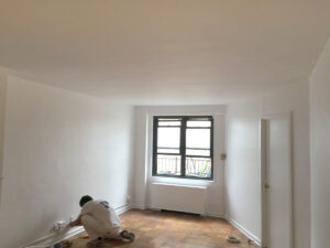 Smoothed, painted, repaired plaster ceiling in an New York City Apartment