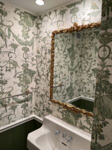 organic pattern wallpaper installed in a bathroom