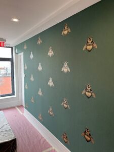 Bee wallpaper in a living room